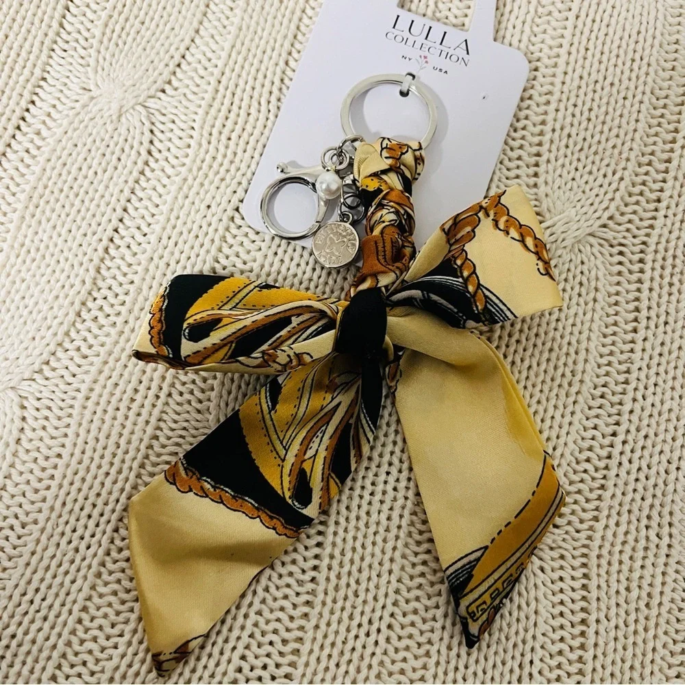 Lulla Collection Women New Bag Charm with Scarf Like Bow Pearl Charm Gold/Black